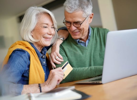 What does it cost? a couple putting down an easy deposit for their train vacation