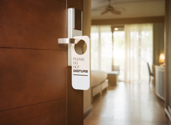 Choose your accommodation style do not disturb tag on hotel door handle