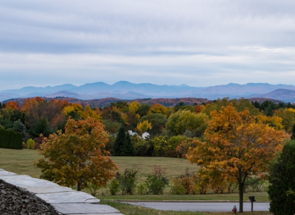 view of fall foliage and Adirondack  Mountains in New York  from Overlook Park in South Burlington, Vermont