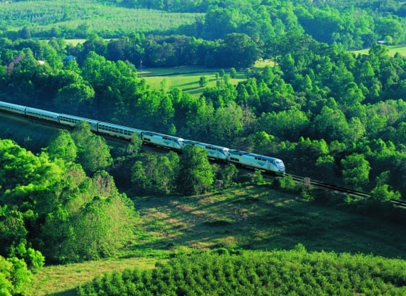 Crescent_through_green_landscape