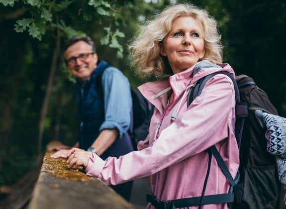 a couple exploring on vacation by rail