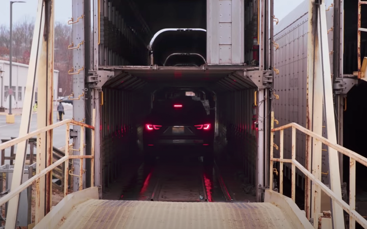car pulling into car on auto train