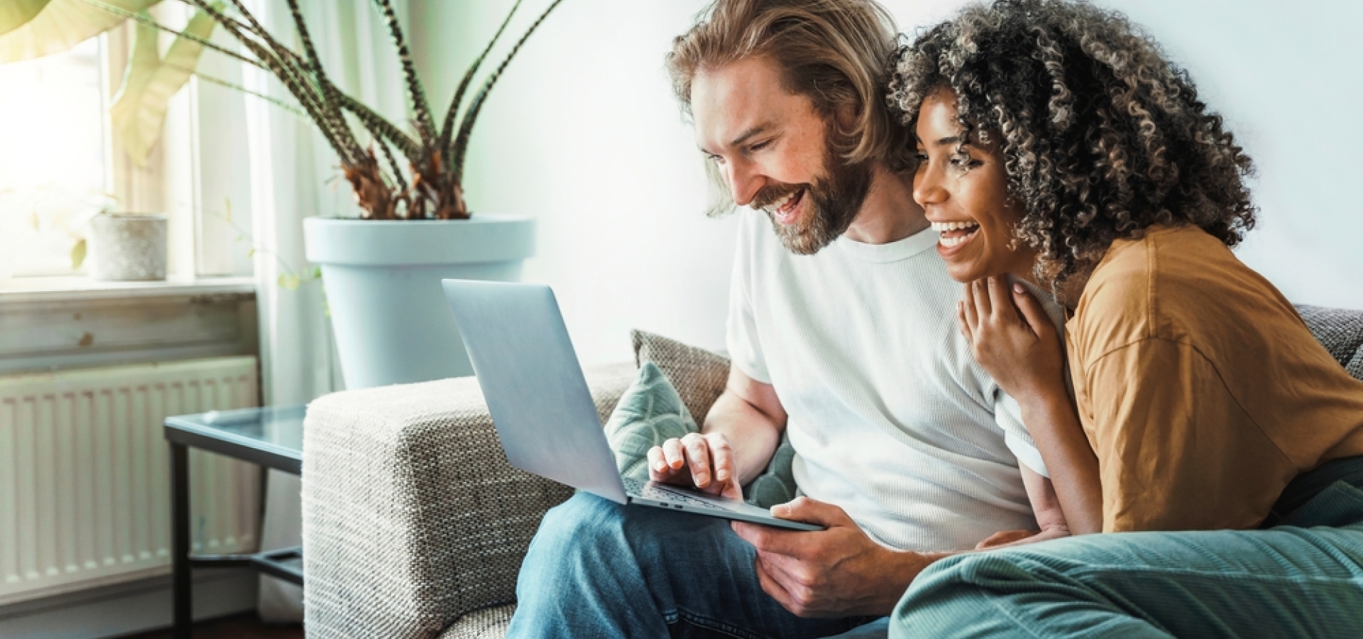 couple watching an Amtrak Vacations webinar