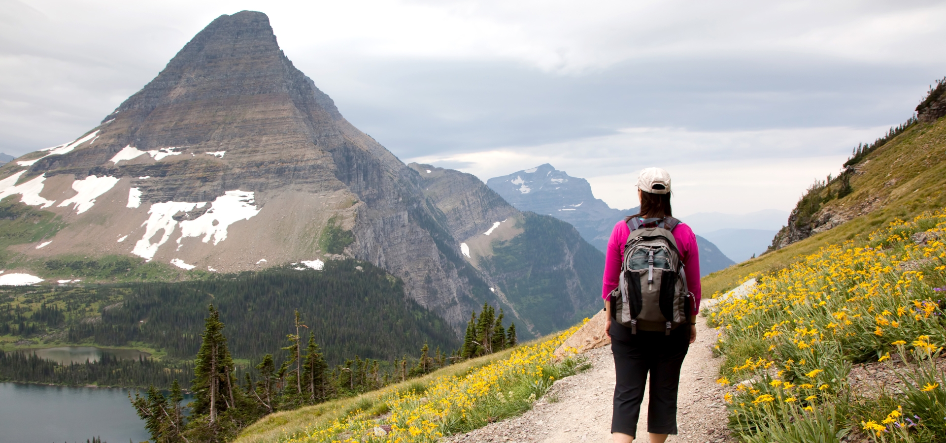 Woman Hiking Mountain Trail (Logan Pass, Glacier National Park)
