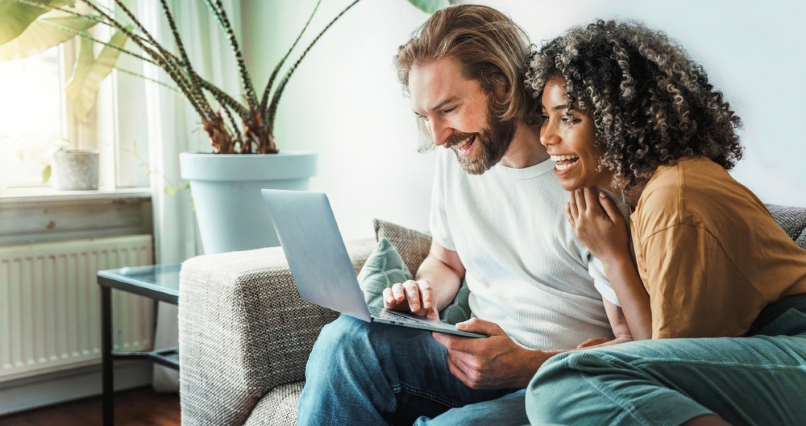 couple watching an Amtrak Vacations webinar