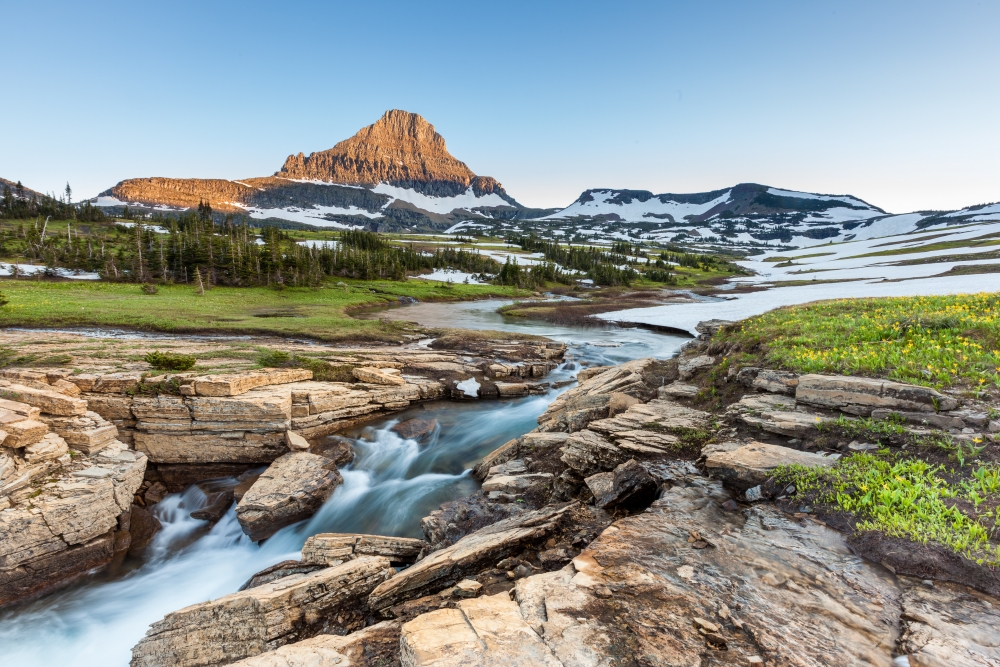 river running over rocks at Glacier National Park